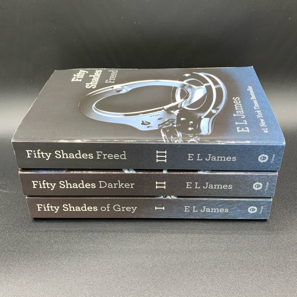 VERY GENTLY used Fifty Shades of Gray, I, II & III